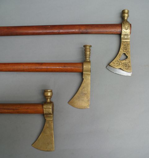 Appraisal: Three brass tomahawks comprising two smokers and one hammer hawk