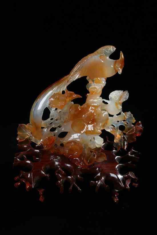 Appraisal: CHINESE AGATE FIGURE OF PHOENIX BIRD Finely carved perched on