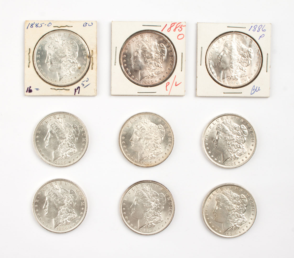 Appraisal: Nine U S Morgan type silver dollars -' comprising three