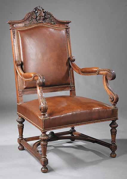 Appraisal: A Louis XIV-Style Fauteuil the molded crest rail with satyr