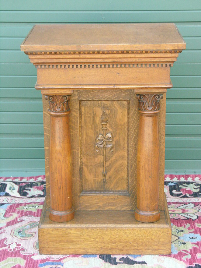 Appraisal: TIGER OAK HIGHLY CARVED STAND Used in the estate to