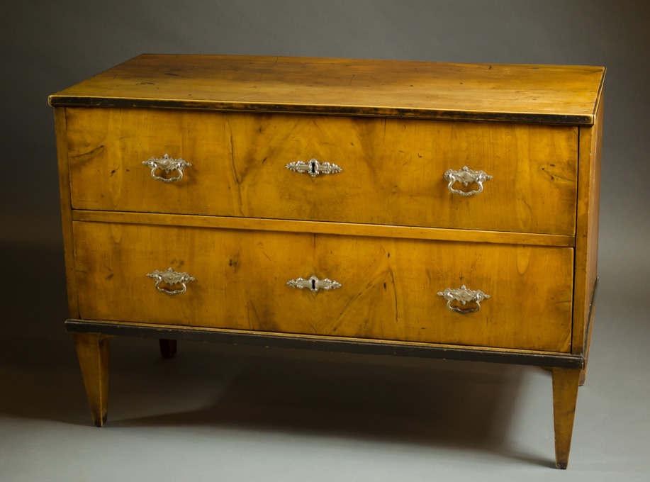 Appraisal: BIEDERMEIER TWO-DRAWER WALNUT COMMODE German mid- th century raised on