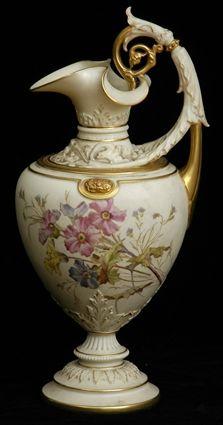 Appraisal: ROYAL WORCESTER PORCELAIN AESTHETIC MOVEMENT EWER The ovoid floral-decorated bowl