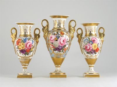 Appraisal: A matched garniture of three English porcelain vases with flared