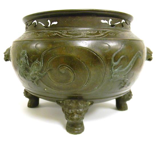 Appraisal: ASIAN th C Chinese pierced bronze brazier raised on four