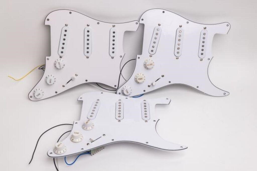 Appraisal: lot of Pre-wired white Stratocaster pickguards unknown brand