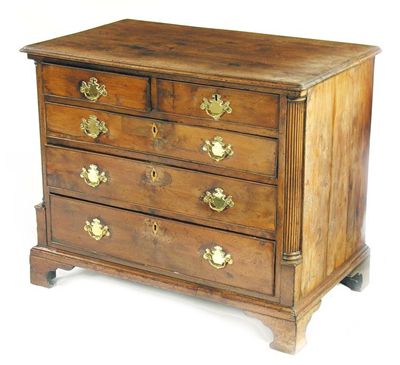 Appraisal: A George III yew wood chest the moulded edge top