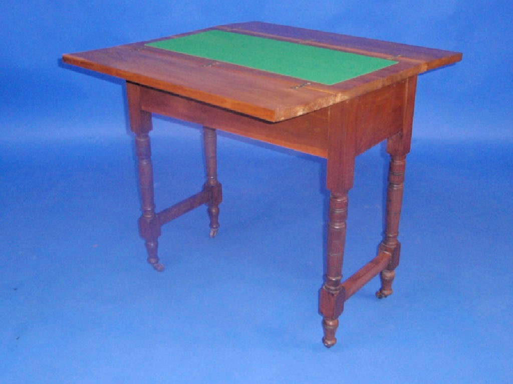 Appraisal: A late Victorian walnut folding card table