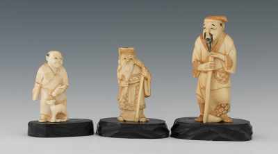 Appraisal: A Group of Three Carved Ivory Figurines Containing a carved