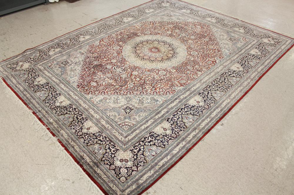 Appraisal: HAND KNOTTED ORIENTAL CARPET Indo-Persian floral and central floral medallion