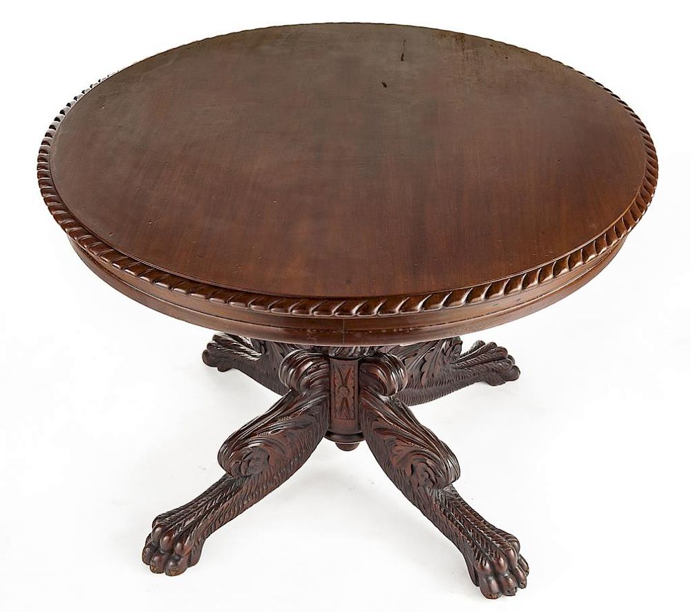 Appraisal: American Empire Revival Center Table DESCRIPTION Carved American Empire Revival