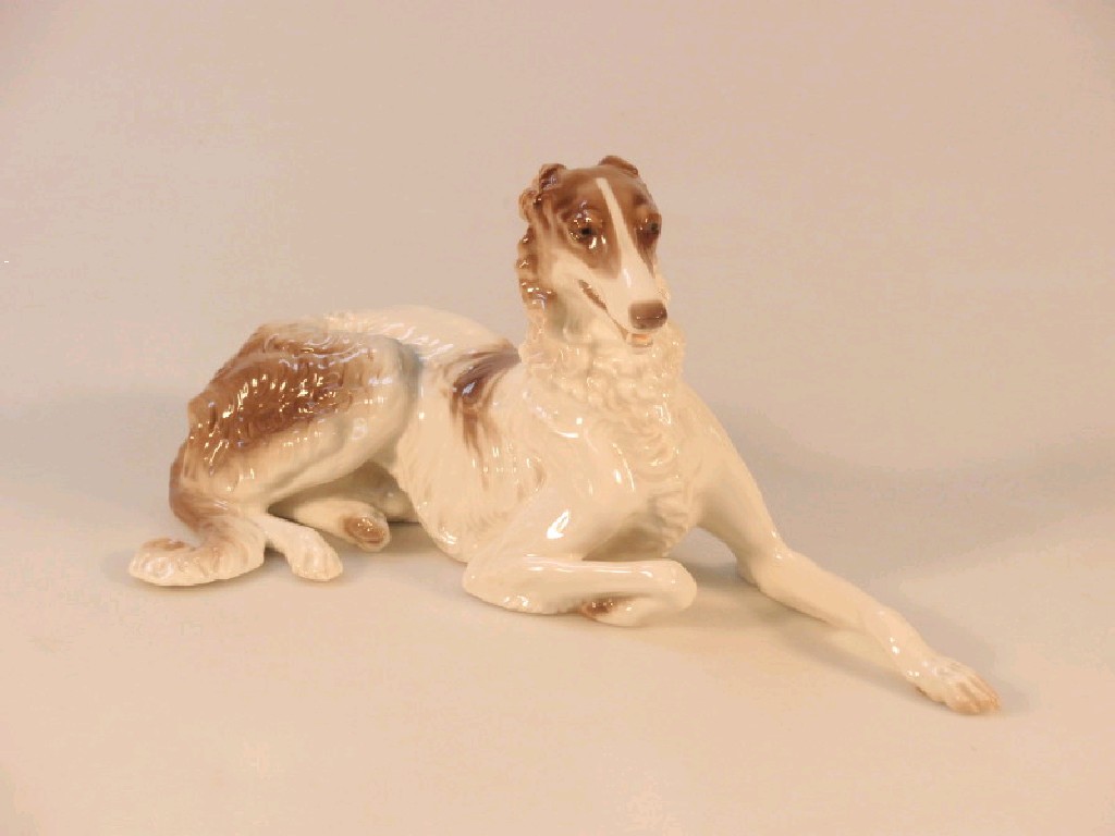 Appraisal: A thC Nymphenburg porcelain figure of a recumbent Borzoi cm