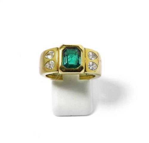 Appraisal: EMERALD AND DIAMOND RING P CLARD Yellow gold Casual-elegant band