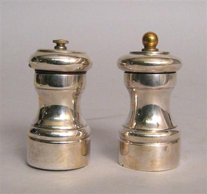 Appraisal: Two sterling silver pepper grinders One marked Sterling Italy the