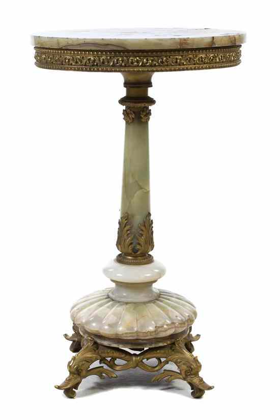 Appraisal: A Continental Onyx and Bronze Gueridon having a circular top