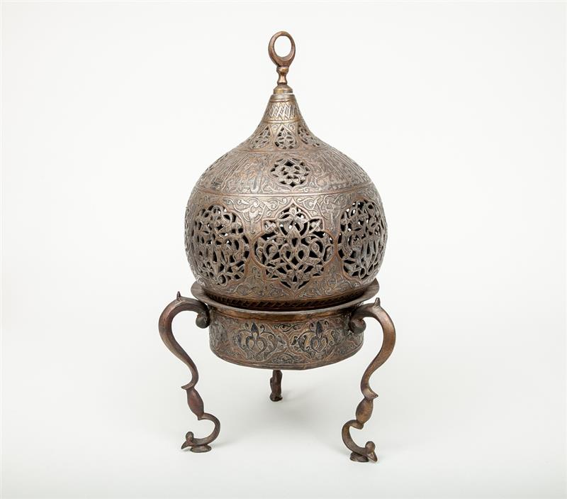 Appraisal: Near Eastern Copper-Inlaid Brass Tripod Censer With a pierced onion-form