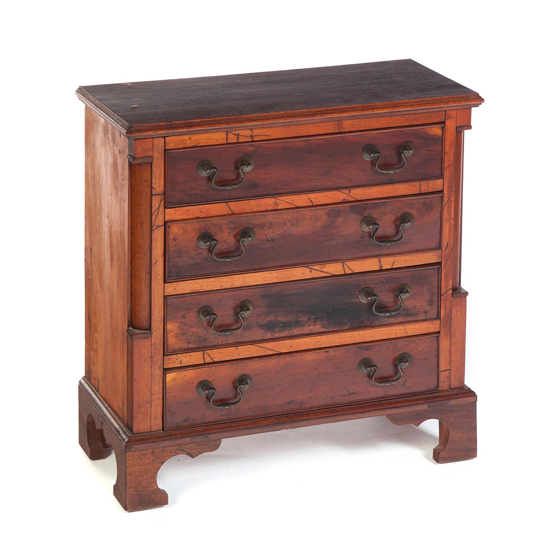 Appraisal: MINIATURE CHIPPENDALE-STYLE BENCH-MADE FOUR-DRAWER CHEST American ca Cut corner pilasters