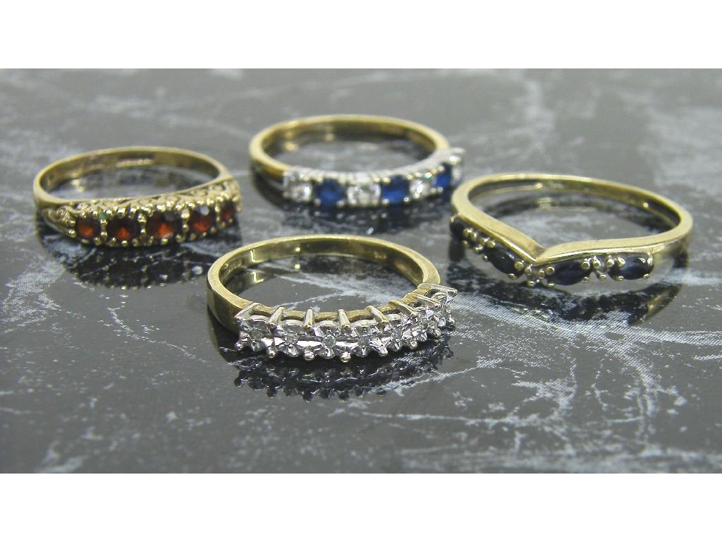 Appraisal: Four ct stone set half eternity rings gm