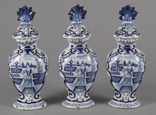 Appraisal: Three Delft garniture vases and covers th th c ''