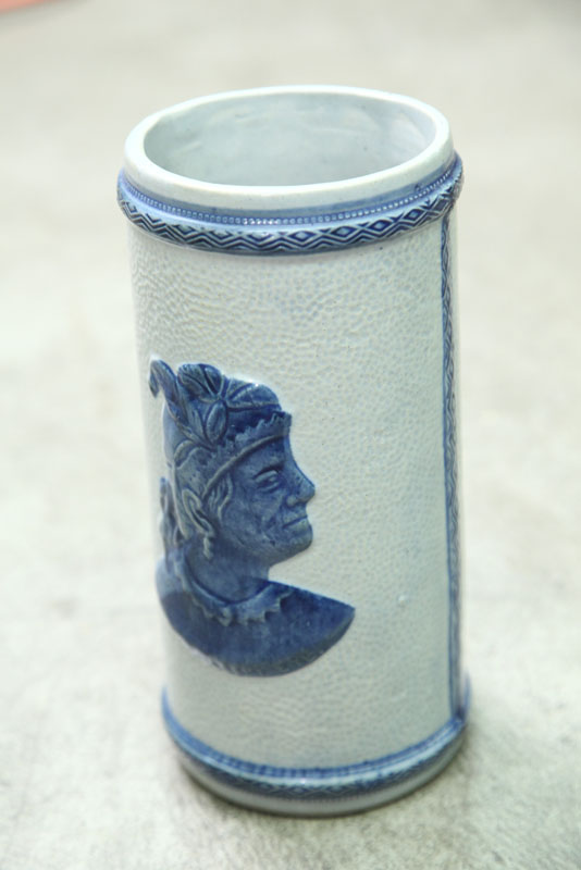 Appraisal: OLD SLEEPY EYE VASE Cylindrical vase with embossed Indian head