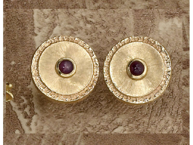 Appraisal: RUBY CUFFLINKS k yellow gold round design set with two