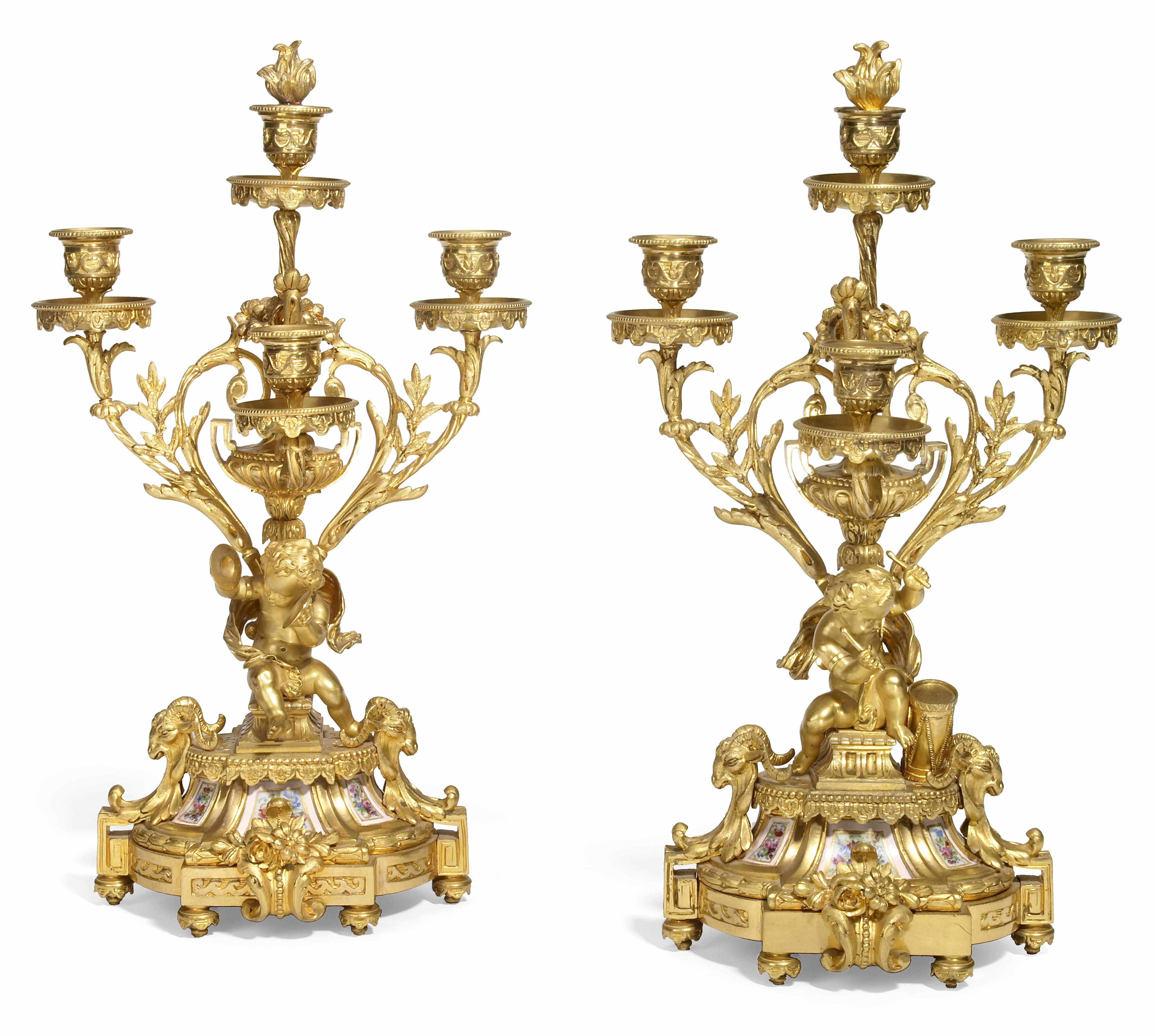 Appraisal: A pair of Louis XVI style gilt bronze and porcelain