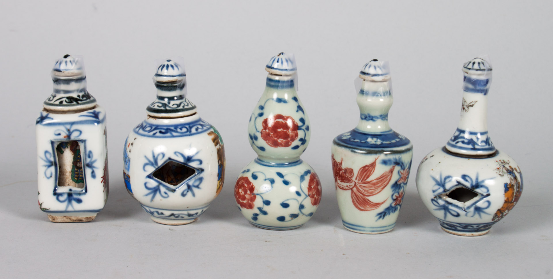 Appraisal: Five Chinese porcelain snuff bottles three blue and white with