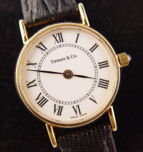 Appraisal: TIFFANY CO K LADIES WATCH White enamel dial with Roman