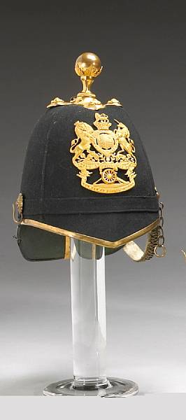 Appraisal: A Victorian blue cloth officer's home service helmet for the