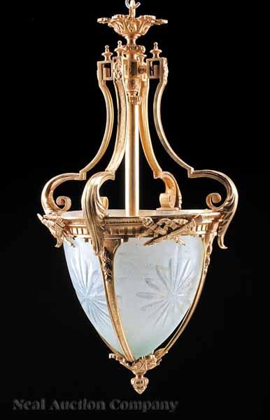 Appraisal: A Pair of Neoclassical-Style Gilt Bronze and Glass Lanterns each