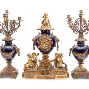 Appraisal: A French Gilt Bronze and Porcelain Clock Garniture Late th