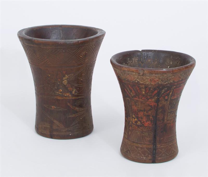 Appraisal: TWO LATIN AMERICAN WOOD BEAKERS One with incised decoration one