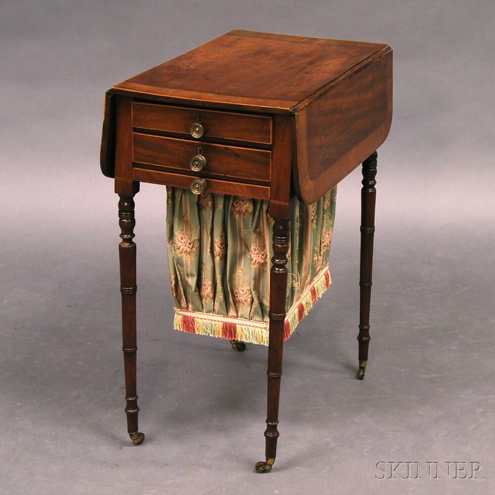 Appraisal: Regency-style Mahogany Drop-leaf Sewing Stand the banded top over a