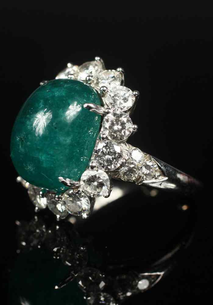 Appraisal: LADY'S RING - Platinum cabochon Emerald and Diamond Ring Designed