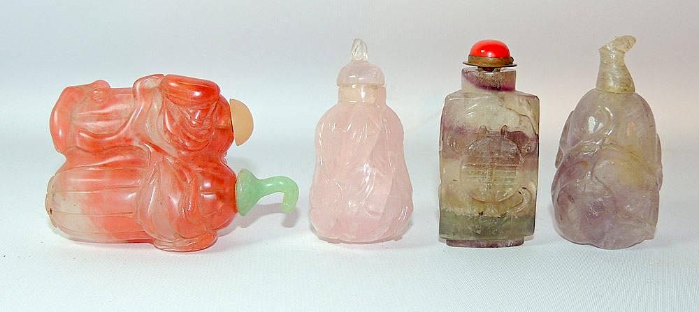 Appraisal: Four Quartz Snuff Bottles Four quartz snuff bottles including a