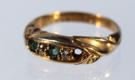 Appraisal: An ct emerald and diamond ring plain shank with twist