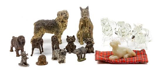 Appraisal: A Collection of Fourteen Dog Figures of Various Breeds Height