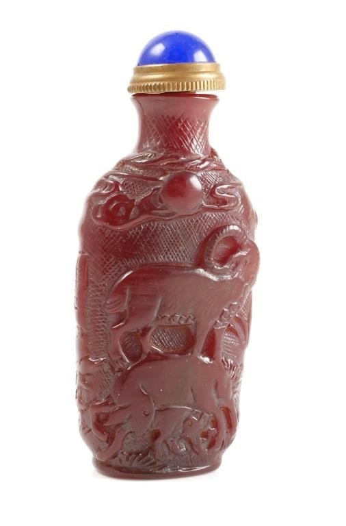 Appraisal: Vintage Chinese ox horn snuff bottle with carved images of