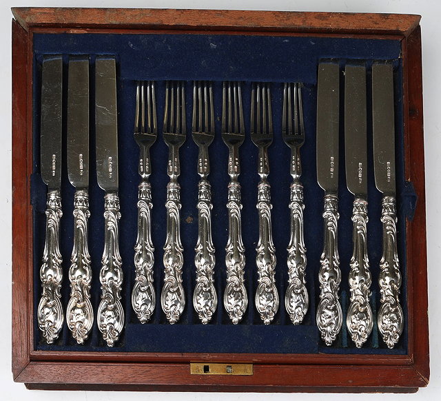 Appraisal: A CASED SET OF TWELVE TEA KNIVES AND FORKS with