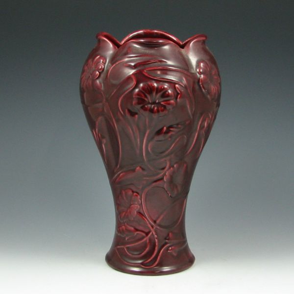 Appraisal: Camark floral vase in oxblood red Marked Camark USA Mint