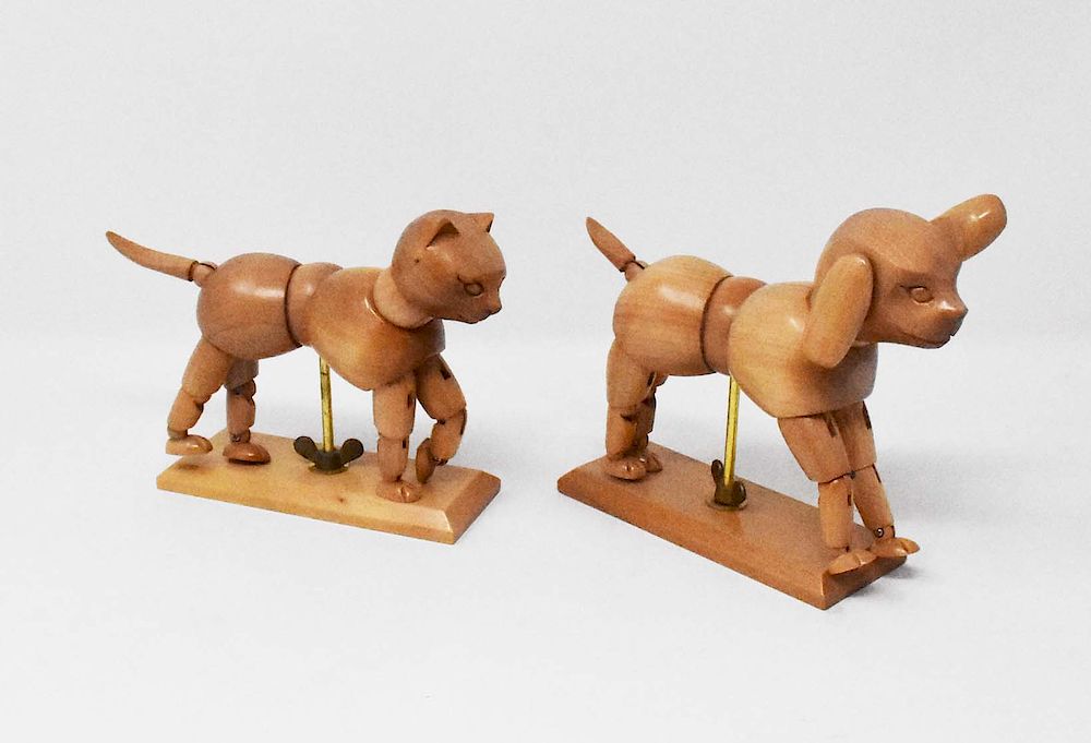 Appraisal: pieces fully jointed wooden dog cat pieces fully jointed wooden