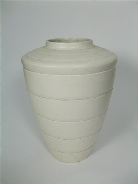 Appraisal: KEITH MURRAY FOR WEDGWOOD TAPERING VASE S with ribbed decoration