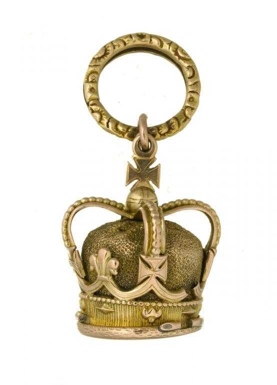 Appraisal: AN UNUSUAL GOLD SALTS BOTTLE IN THE FORM OF THE