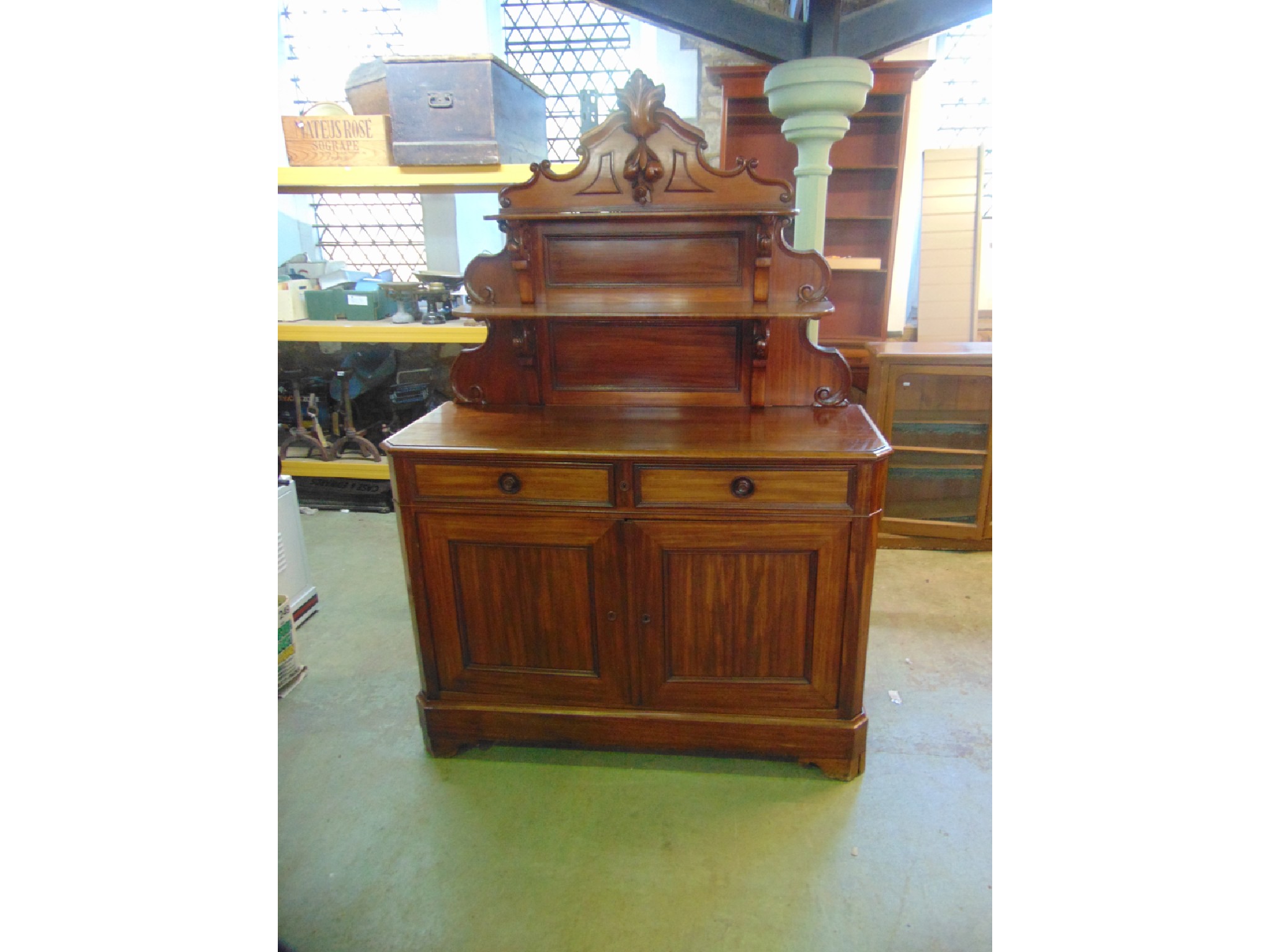 Appraisal: A good quality th century mahogany chiffonier the base enclosed