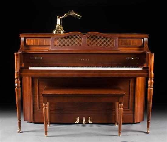 Appraisal: Yamaha banded mahogany cased upright piano Model U with matching