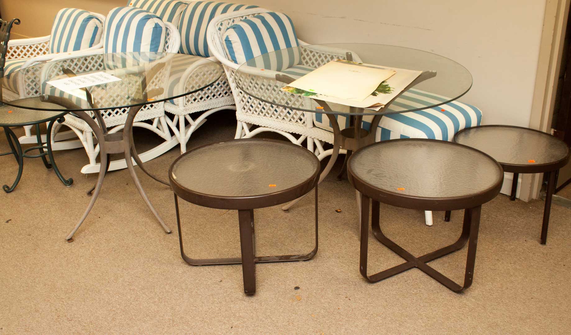 Appraisal: Group of five glass top patio tables