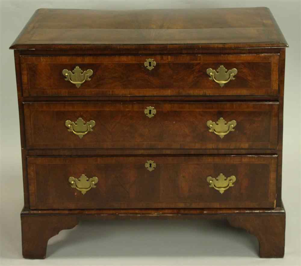 Appraisal: GEORGE II WALNUT INLAID CHEST OF DRAWERS having a rectangular