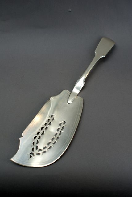 Appraisal: A sterling silver fiddle pattern fish slice by George Ferris