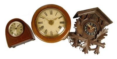 Appraisal: A postman's alarm clock with a painted dial inscribed 'Camerer