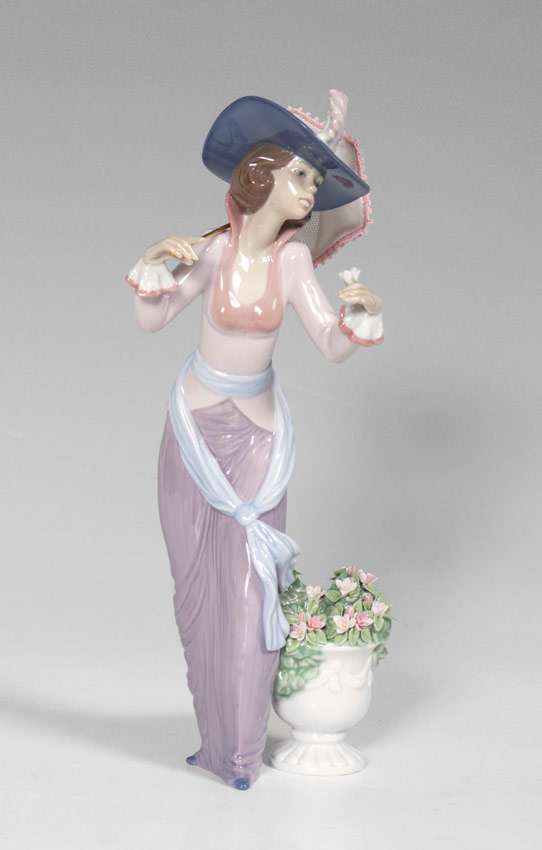 Appraisal: LLADRO PORCELAIN FIGURE ''FLOWERS OF PARIS'' Regino Torrijos sculptor issued